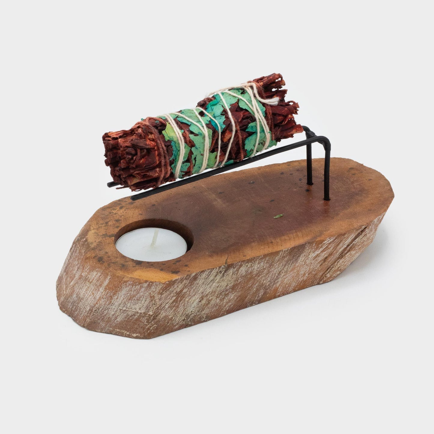 Palo Santo Heater handcrafted from White Wash Gamel wood with metal supports holding a smudge stick and an indentation for a tea light