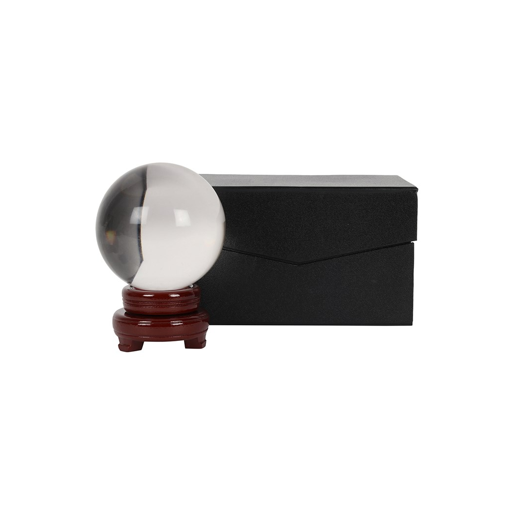 Crystal ball on wooden stand with box