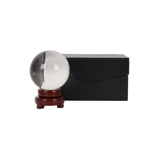 Crystal ball on wooden stand with box