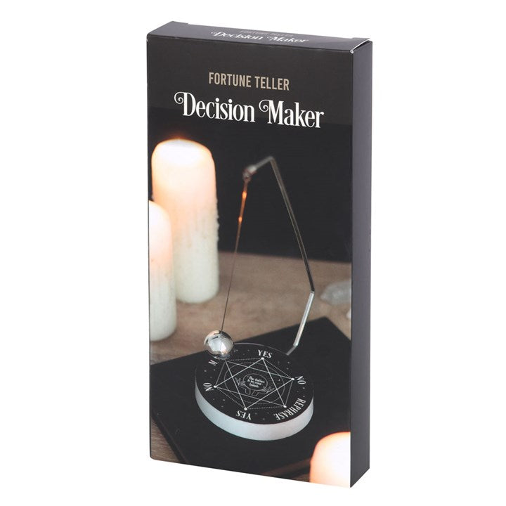 Box for a 'Fortune Teller Decision Maker' product with a candle and pendulum on a white background.