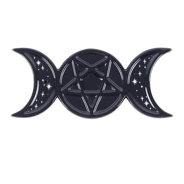 A glossy black ceramic tray featuring a triple moon symbol with a pentagram and white star details, set against a plain white background.