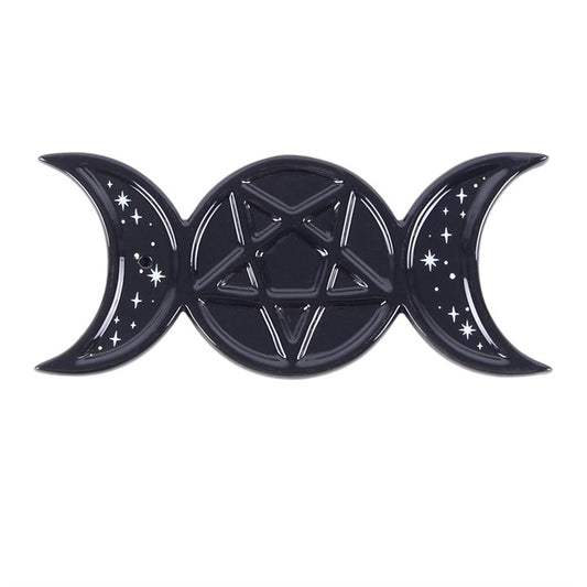 A glossy black ceramic tray featuring a triple moon symbol with a pentagram and white star details, set against a plain white background.