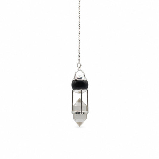A silver-toned crystal pendant necklace featuring a double-pointed clear quartz point suspended in a cage, with a polished black bead accent and a delicate silver chain, shown against a plain white background.
