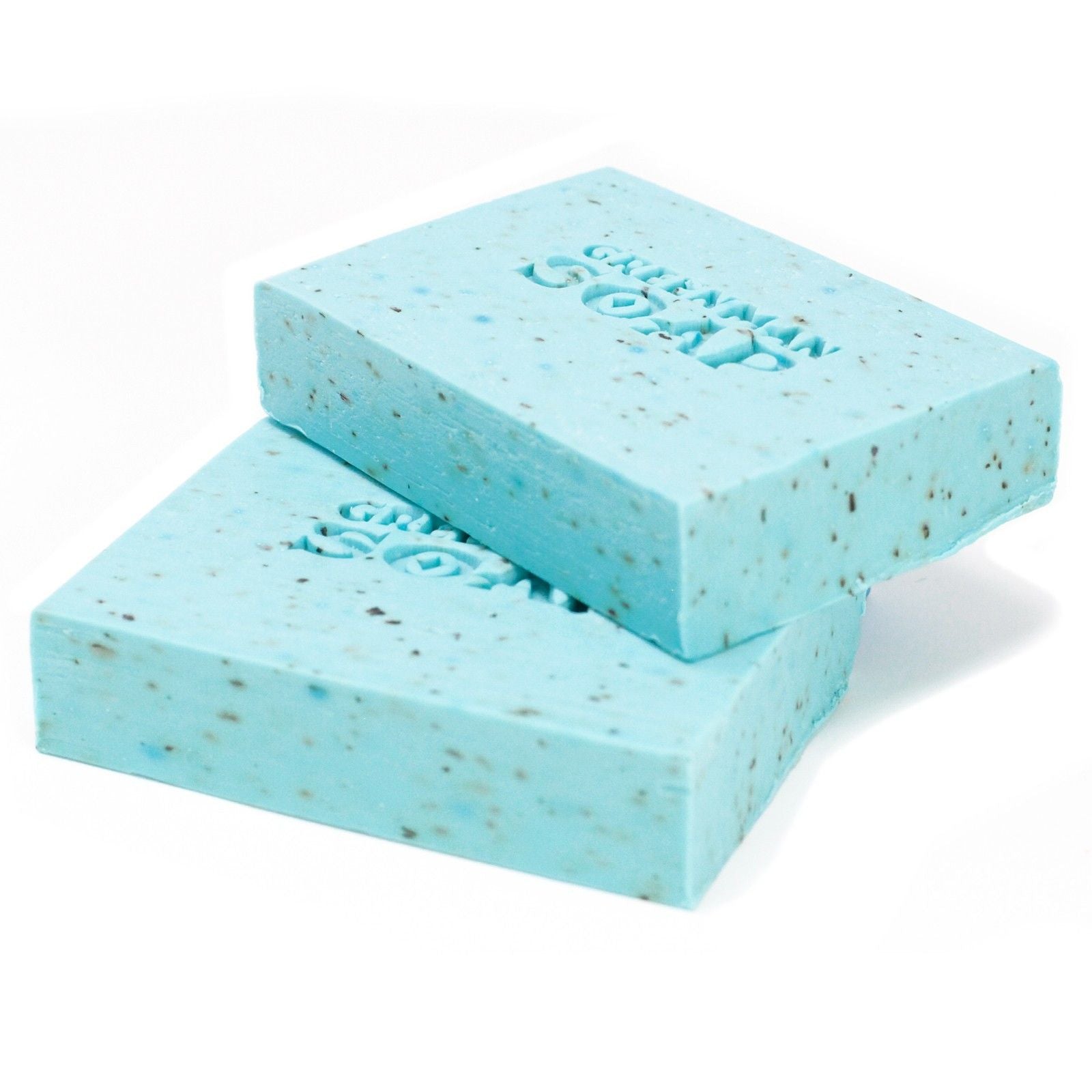 Two blue sponges with 'Green Soap' branding on a white background