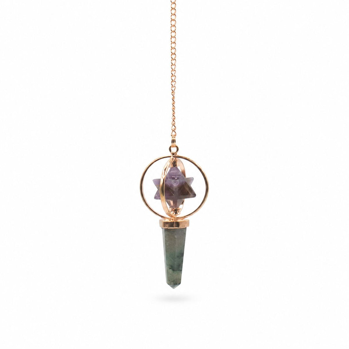 Crystal pendant necklace with rose gold chain on a white background
