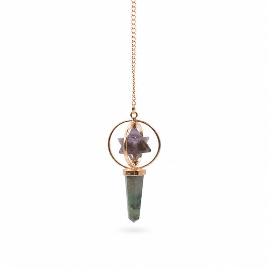 Crystal pendant necklace with rose gold chain on a white background