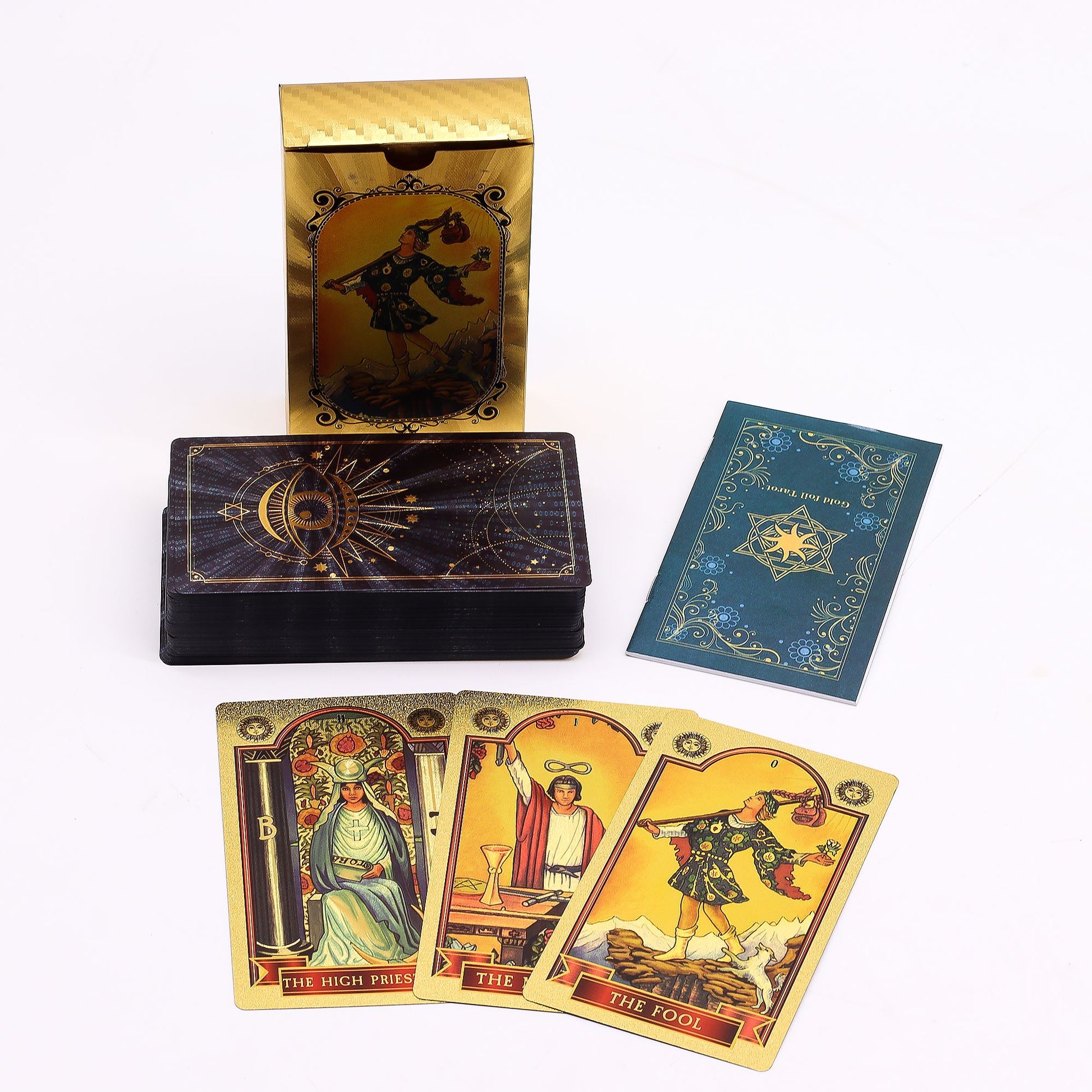 Tarot cards and mystical items on a wooden table with candles and crystals.