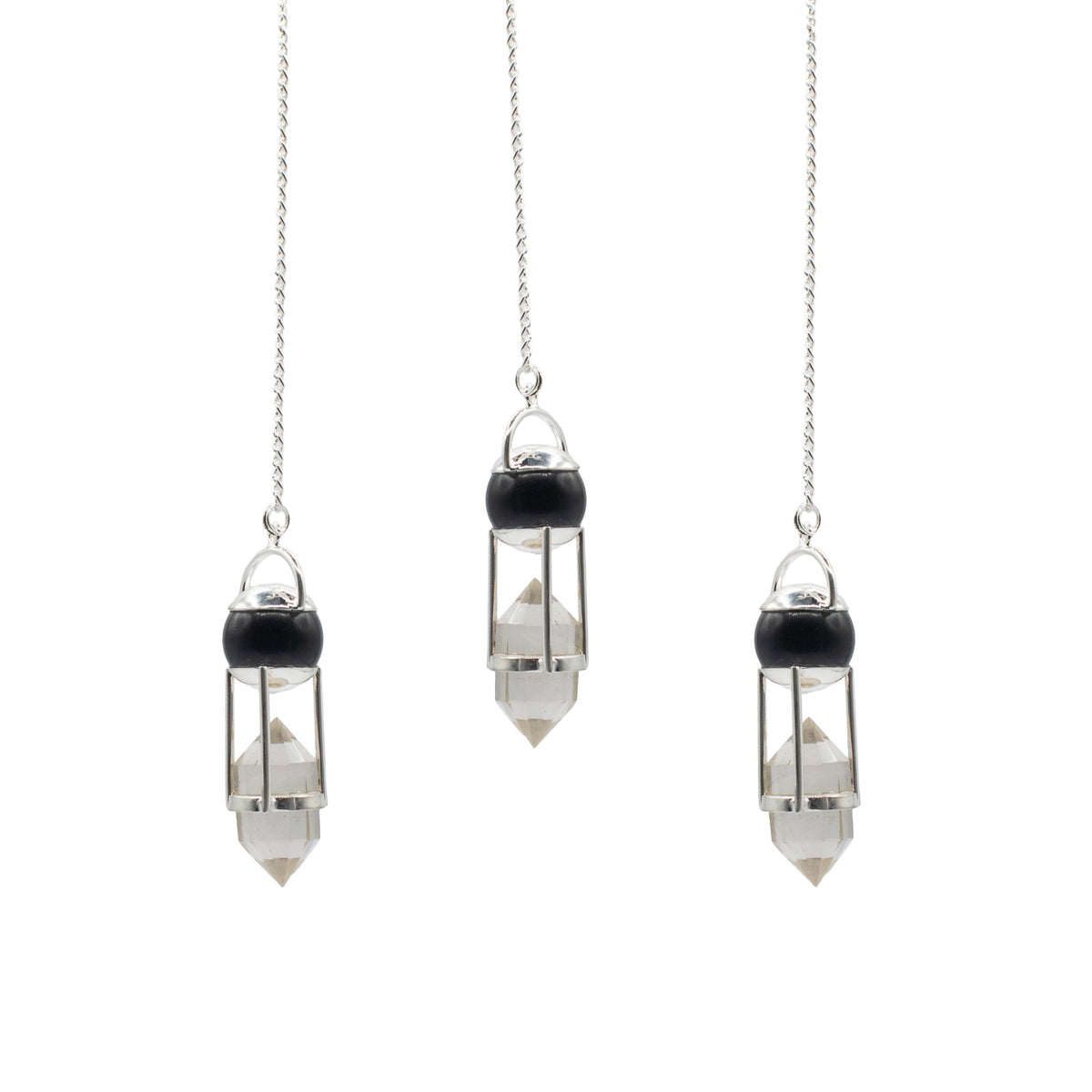 Three crystal pendulums with black beads on white background