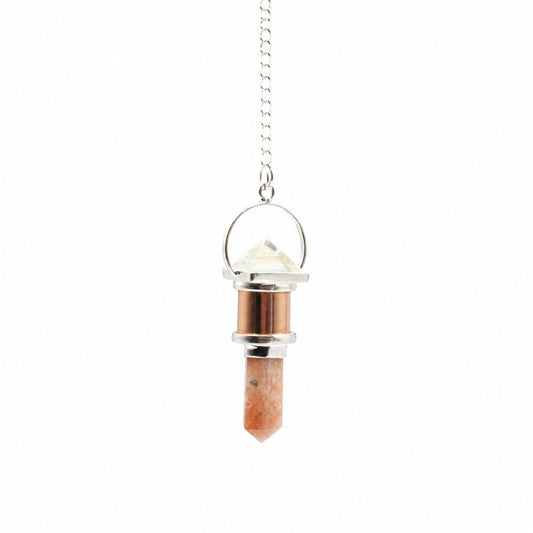 Decorative crystal pendant on a chain on a white background