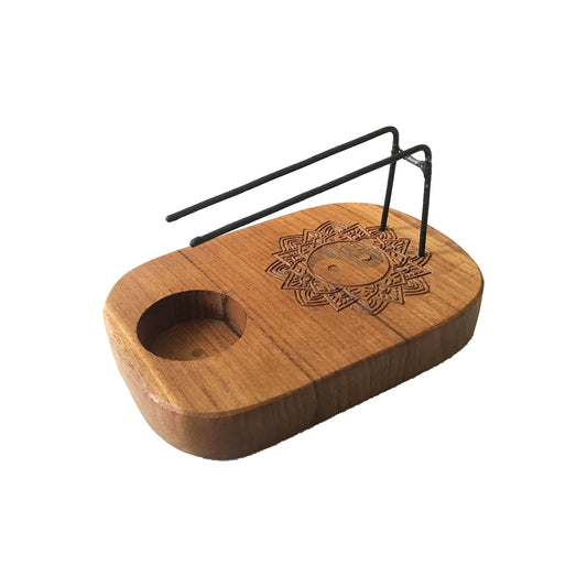 Ying Yang design Palo Santo Heater. Palo Santo Heaters are handcrafted from premium teak wood in Indonesia with metal supports for a smudge stick and an indentation for a tea light
