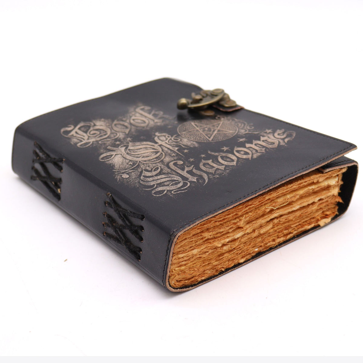 Black leather-bound book with gold embossed text on a white background