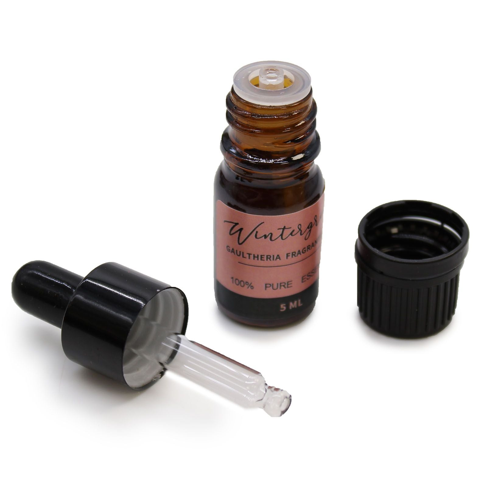 Brown glass essential oil bottle with dropper on a white background