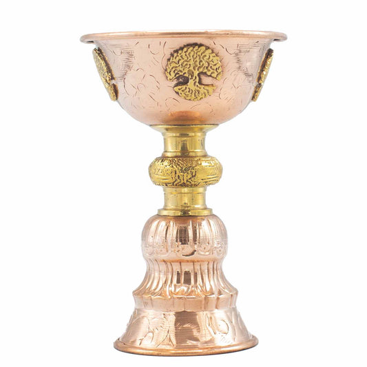 Copper and gold decorative cup on a white background