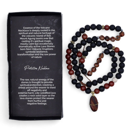 Beaded necklace with dark and red beads next to a black box with text on a white background