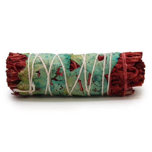 A smudge stick bundle of sage leaves tied together, traditionally used in rituals of purification and cleansing, fragranced with Dragons Blood Floral