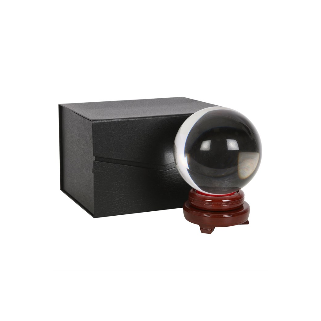 Crystal ball on wooden stand with box