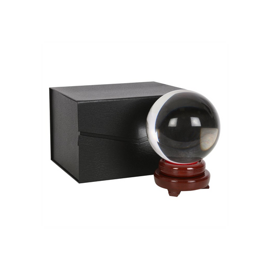 Crystal ball on wooden stand with box